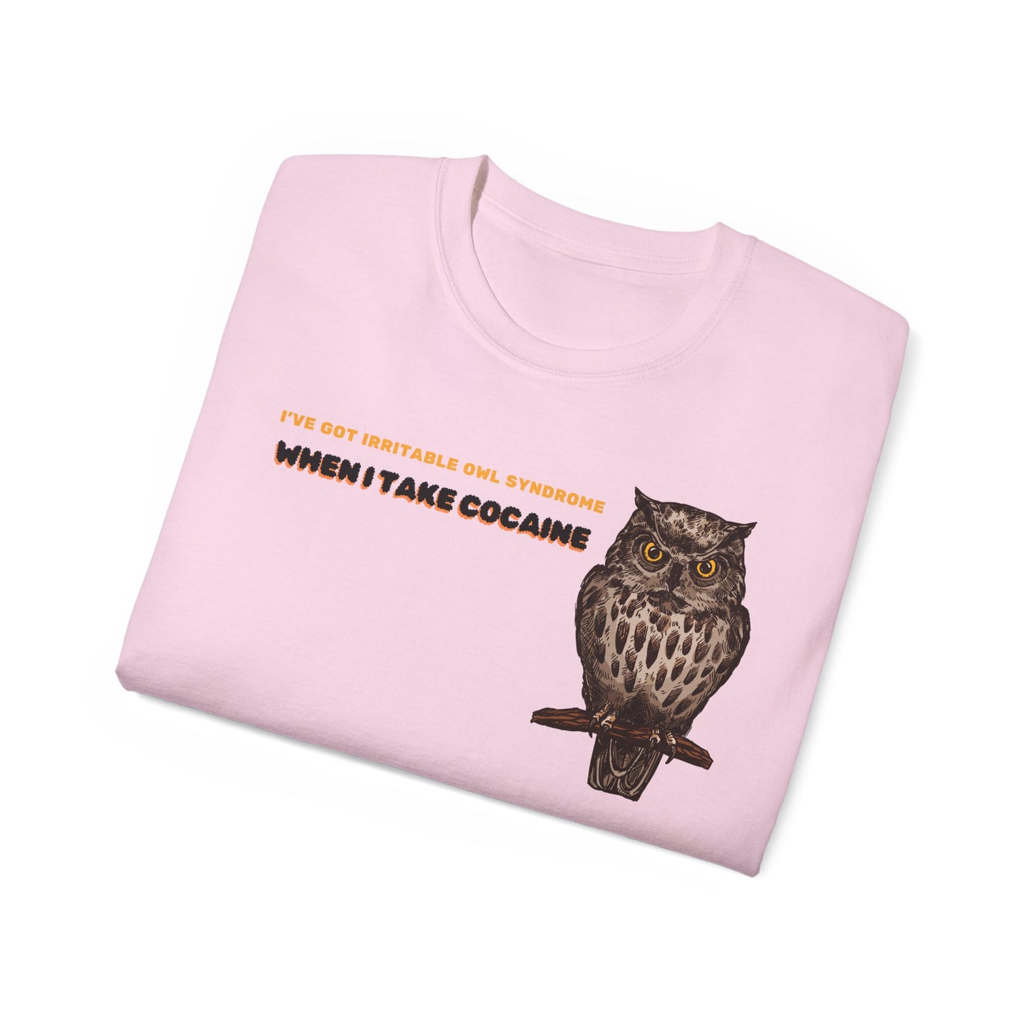 Folded Irritable Owl Syndrome T-shirt with owl pun partially visible, pink colour version