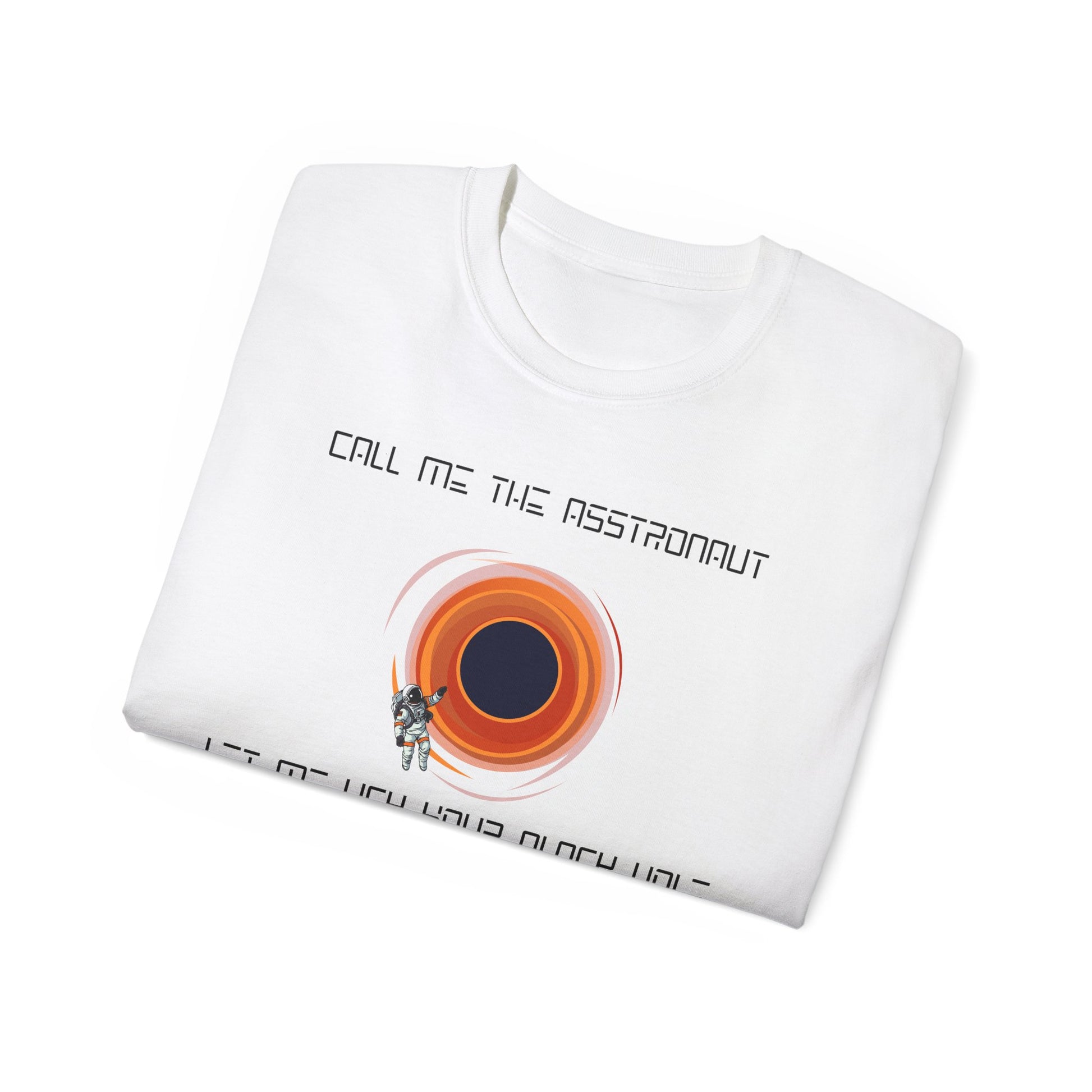Folded Asstronaut T-shirt with partial black hole design visible