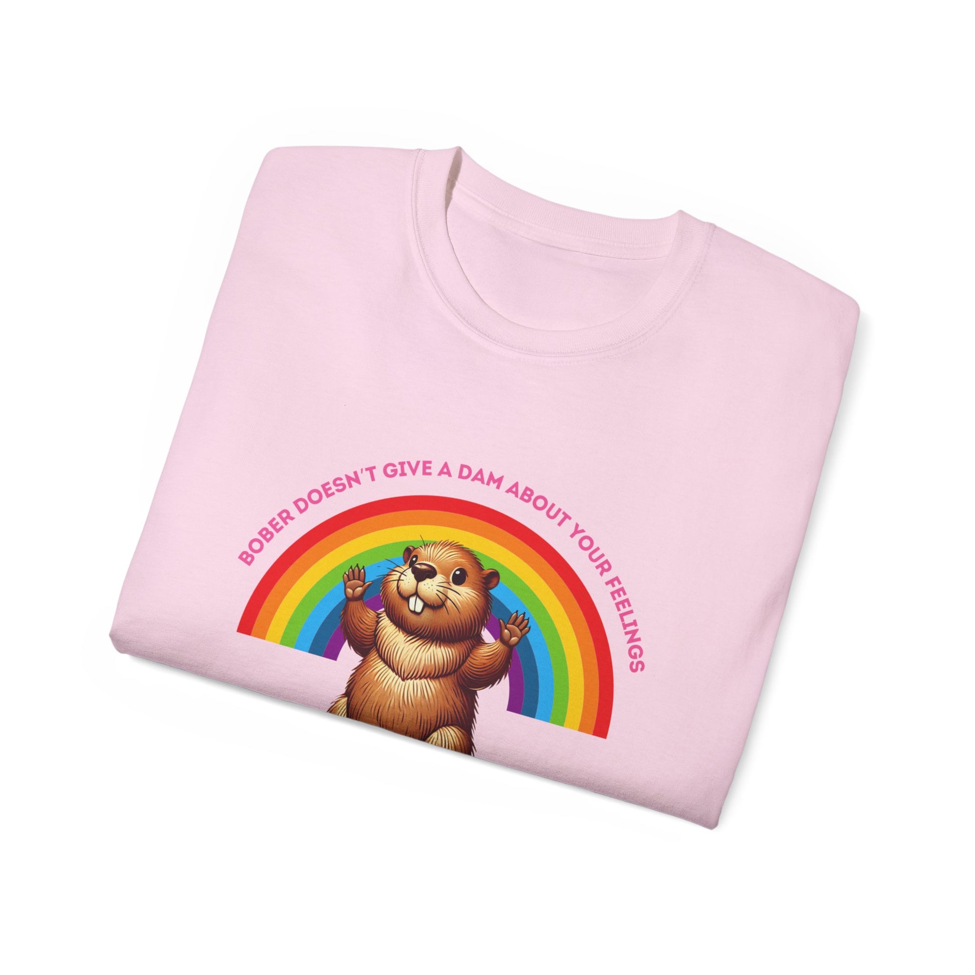 Folded Bober Doesn’t Give a Dam T-shirt showing partial rainbow beaver meme design, pink colour version