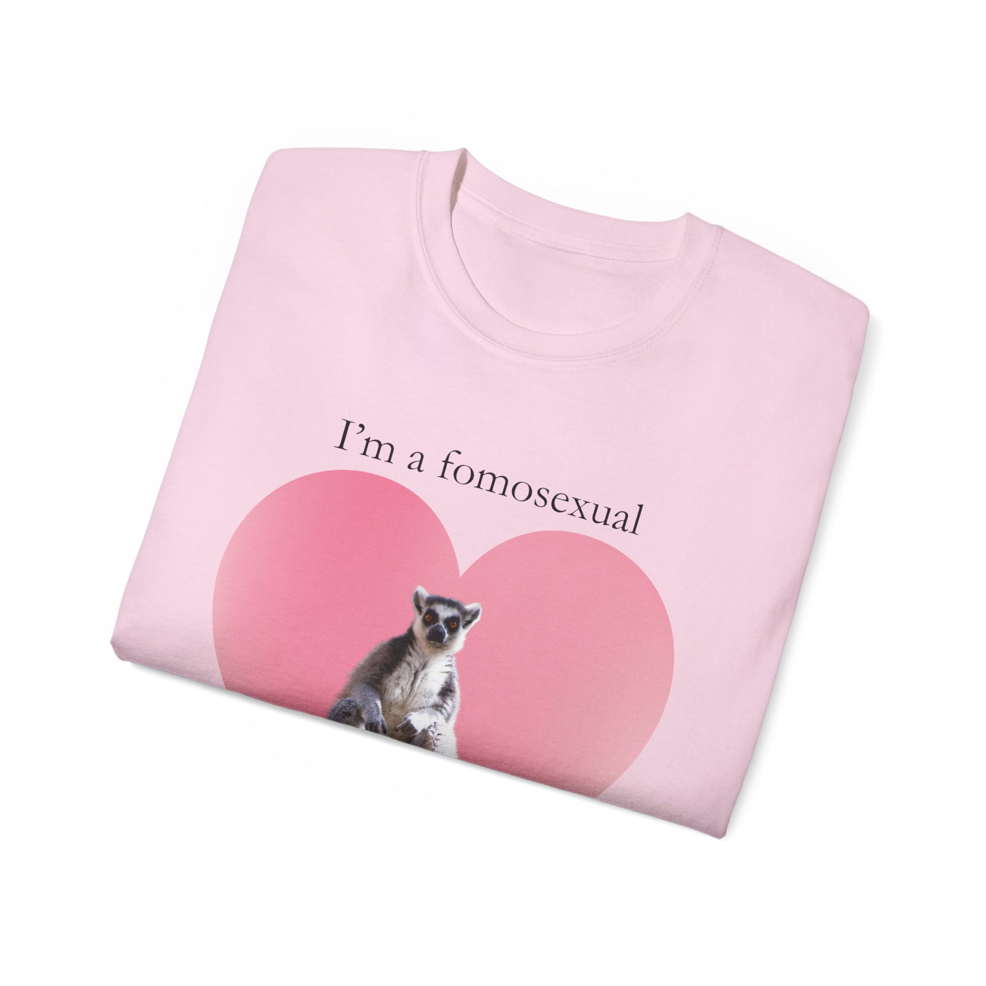 Folded FOMO T-shirt showing part of lemur and heart design