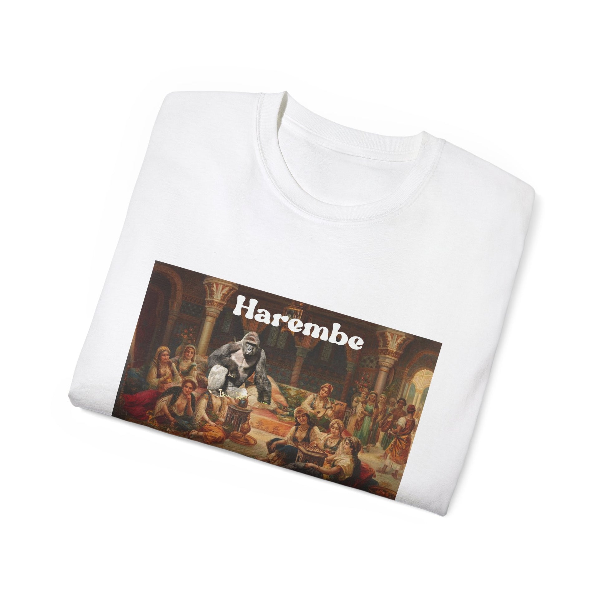Folded Harembe T-shirt partially showing the gorilla and harem design on fabric white