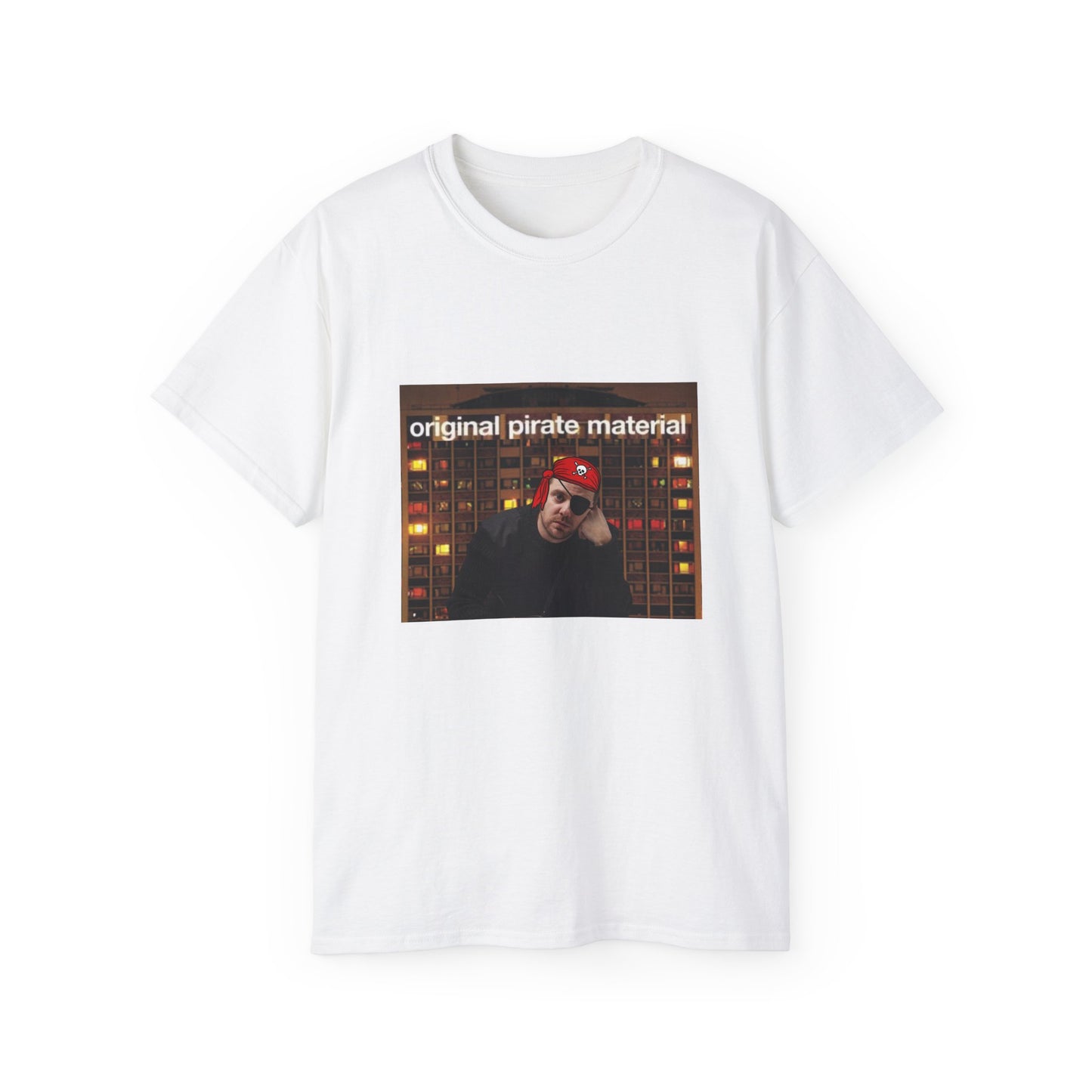 Front view of Original Pirate Material T-shirt featuring Mike Skinner dressed as a pirate in front of tower block
